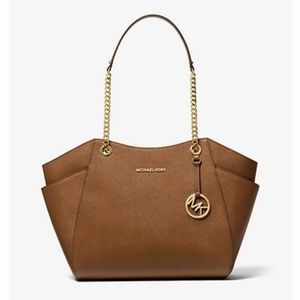 Michael kors jet set large staffing leather bag